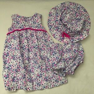 Baby girl dress and hat set.